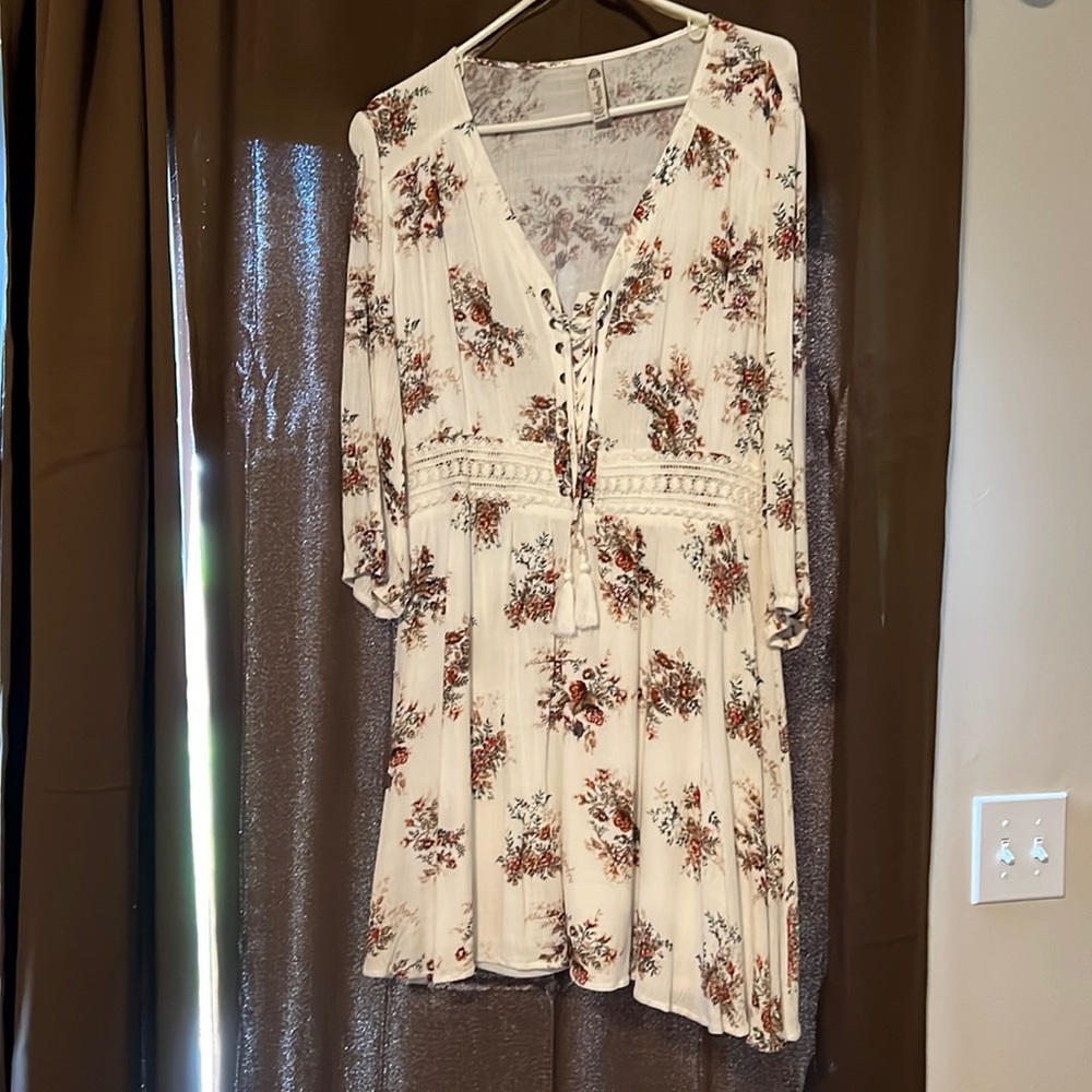 American Rag dress worn only one time. It’s an X-Large in junior.